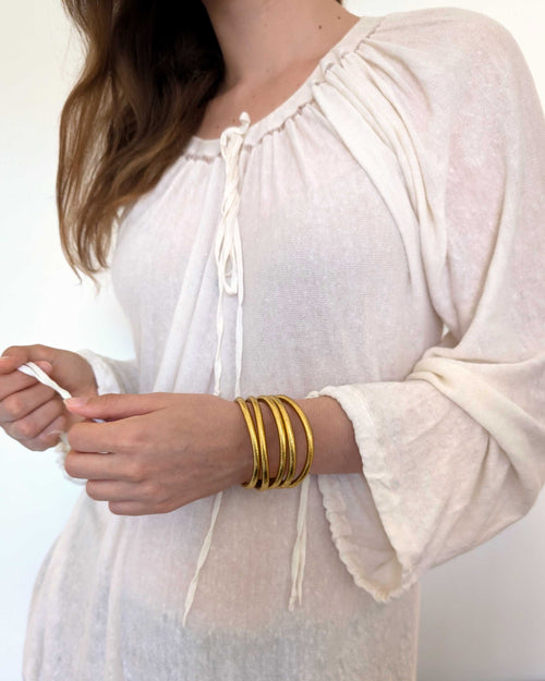 Kumlai Buddhist bangles in classic gold | Chunky